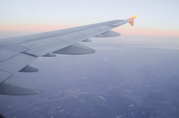 Landscape from the cockpit of an airplane in the evening light