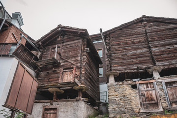 Special historical construction of old log cabins in Swiss mountains alps.