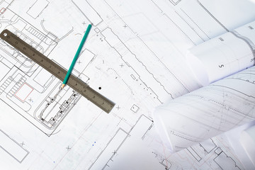 Paper architectural drawings and blueprint, interior design plans and projects