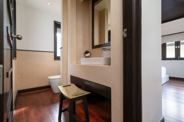 Obraz na płótnie Canvas Interior design of house, home, villa, condo, apartment feature basin, hand towel and toilet bowl in washroom