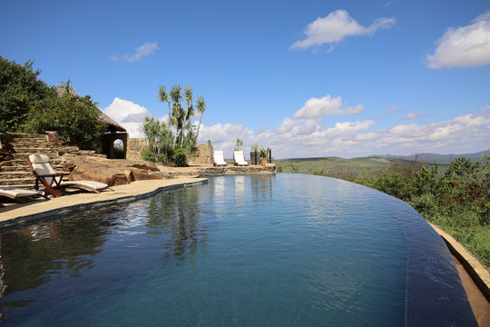 Infinity Pool Looking Out Over African Serengeti In Maasai Mara, Kenya, Africa