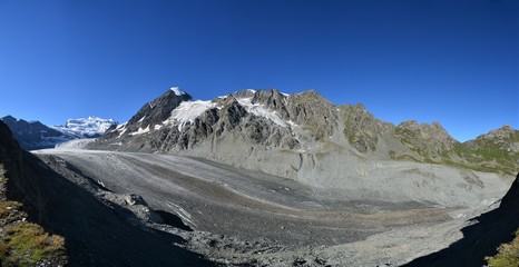 Panorama in the swiss alps with glaciers and mountains in Valais. With the Grand Combin mountain...