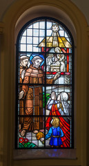 Kalety Miotek, Poland, April 7, 2020: Stained glass window in the church of St. Francis of Assisi in Miotek in Silesia in Poland.