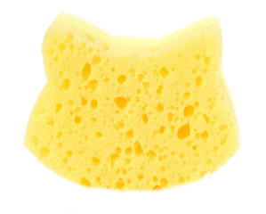 Yellow baby washcloth in the shape of a cat for bathing in the bath or shower.