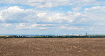 Fototapeta na wymiar panoramic view of the industrial city on the horizon