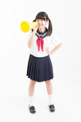 メガホンで応援する女子中学生