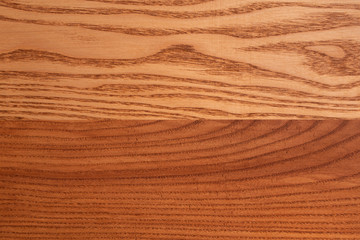 The structure of natural ash wood, tinted oak. Hardwood. Creative vintage background. Imitation of aging.