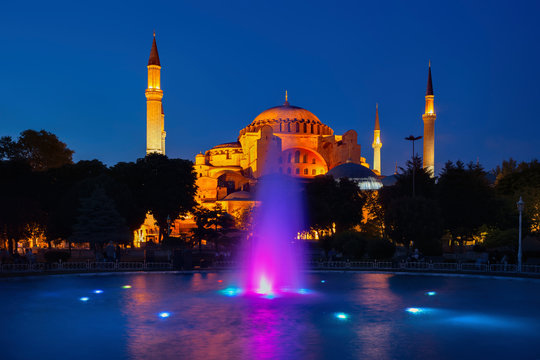 Turkey, Istanbul, Fountain in Sultan Ahmet Park at night with Hagia Sophia in background