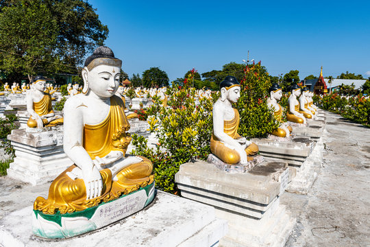 Myanmar, Kachin state, Aung Zay Yan Aung Pagoda, Buddha statues outside temple