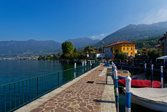 Italy, Lombardy, Sulzano, Boats moored on lake&nbsp;Iseo