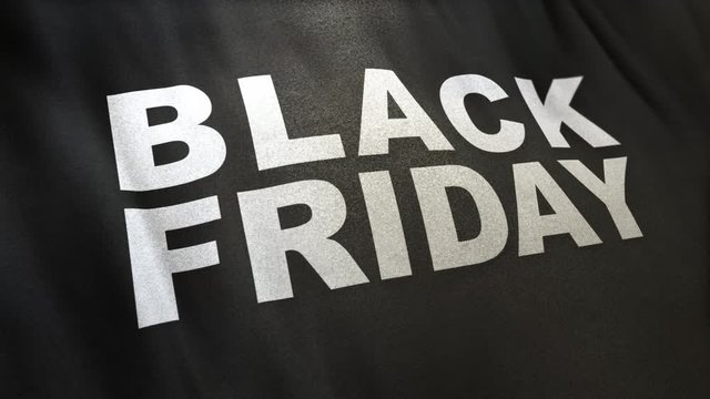 seamlessly looping 3D Animation of Black Friday slogan in white letters on full-frame black satin textured flag with selective focus