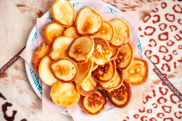 fresh baked pancakes are on a plate. Tasty breakfast.