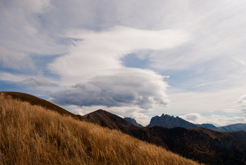 Lenticular clouds over mountains in Bolshoy Tkhach national park