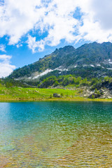 Naklejka na ściany i meble Alpine lake in Gran Paradiso National Park, Italy