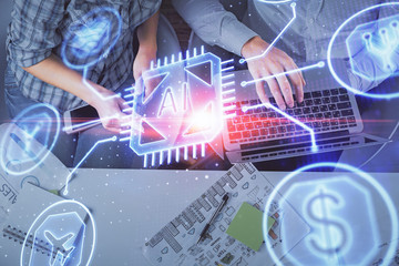 Double exposure of man and woman working together and data theme hologram drawing. Computer background. Top View.