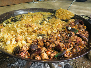 Paella pan in preparation process