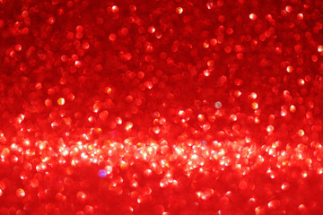 Red glitter texture christmas abstract background, Defocused