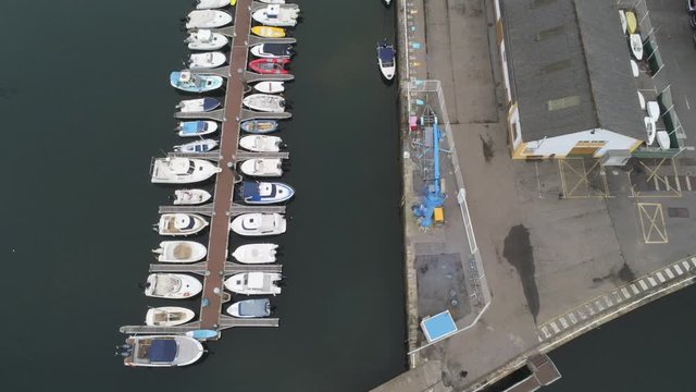Boats in Navia, coastal village of Asturias,Spain Aerial Drone Footage