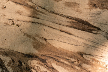 Swirled sand and dirt