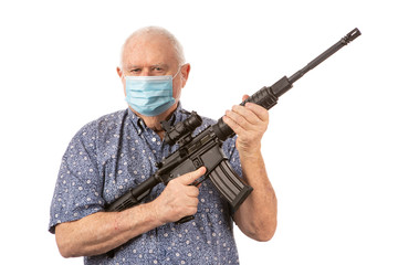 Armed senior citizen with an AR 15 style rifle and a protective face mask.