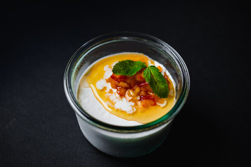 delicious pudding with peach topping