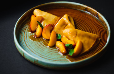 delicious pancakes with caramel topping