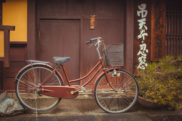 Fototapeta na wymiar Japanese tipical house with bycicle