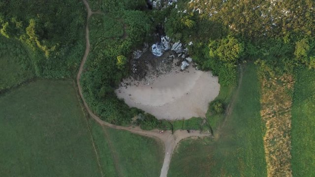 Asturias. Beautiful landscape in the coastal area of Gulpiyuri beach. Spain. Aerial Drone Footage