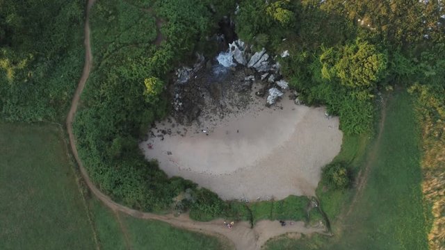 Asturias. Beautiful landscape in the coastal area of Gulpiyuri beach. Spain. Aerial Drone Footage