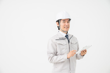 ビジネスマン　作業服　タブレット