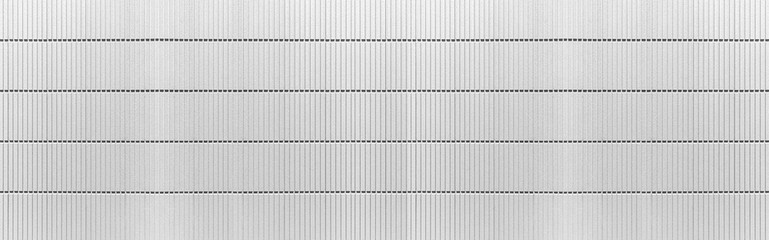 Naklejka premium Panorama of Modern white stone wall with stripes texture and seamless background
