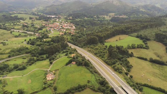 Road in Asturias. Highway in beautiful green landscape. Spain. Aerial Drone Footage