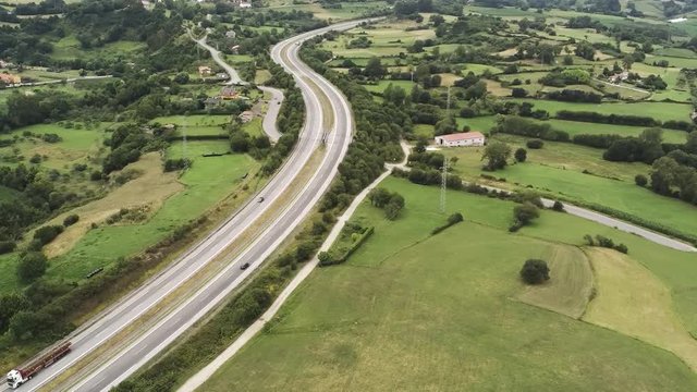 Road in Asturias. Highway in beautiful green landscape. Spain. Aerial Drone Footage