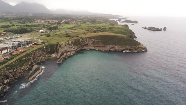 Cliffs in Llanes, beautiful coastal village of Asturias,Spain. Aerial Drone Footage