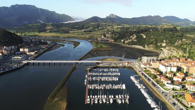 Harbour of Ribadesella, coastal village of Asturias,Spain. Aerial Drone Footage