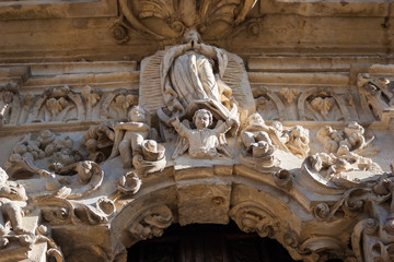 Cherubs and Angel on The Hand Carved Facade of Mission San José y San Miguel de Aguayo (Mission...