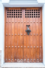 Wooden door of the old town of Cartagena