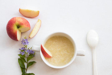 mix apple mashed with milk healthy foods health care for baby eats breakfast arrangement flat lay style on background white 