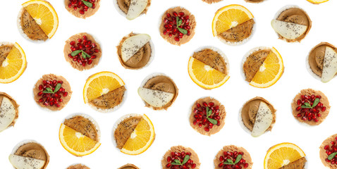Set of puffed corn cakes with peanut butter on white background, top view. Pattern banner design