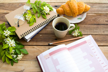 notebook project year planner ,calendar book for business work with hot coffee espresso ,dessert...