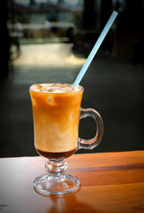 ice cold coffee latte caramel close up