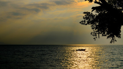 Fototapeta na wymiar Sunset over a lake in Guatemala