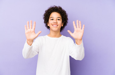 African american little boy isolated showing number ten with hands. - Powered by Adobe