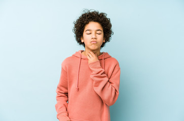 African american little boy isolated suffers pain in throat due a virus or infection.