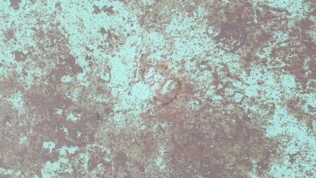 Close up shot of sheet of water running slowly, Laplace's law, example of surface tension of liquids