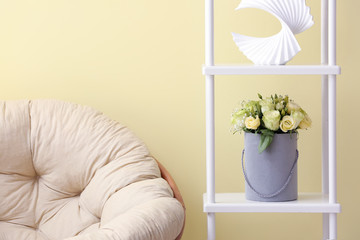 Interior of room with bouquet of beautiful flowers
