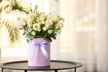 Bouquet of beautiful flowers on table