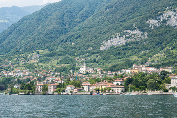 Fototapeta na wymiar Waterfront of Mezzegra Municipality on Lake Como. Lombardy. Italy.