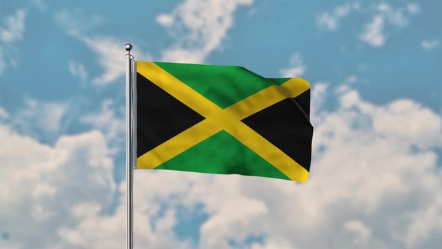 Jamaica flag waving in the blue sky realistic 4k Video