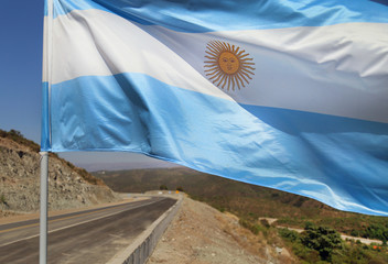 ARGENTINE FLAG FLAMING IN THE CITY